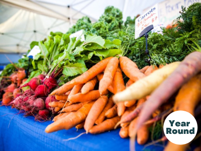 Carrots and beets displayed on a table